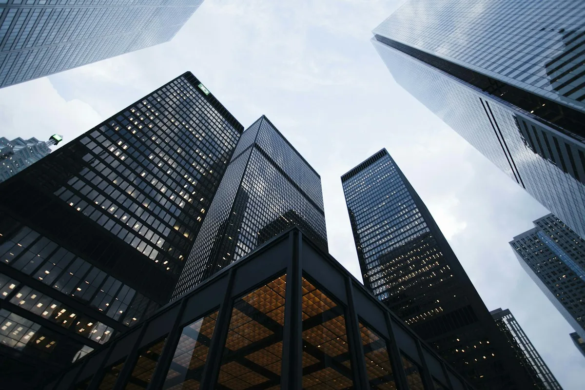 Modern commercial buildings representing financial services